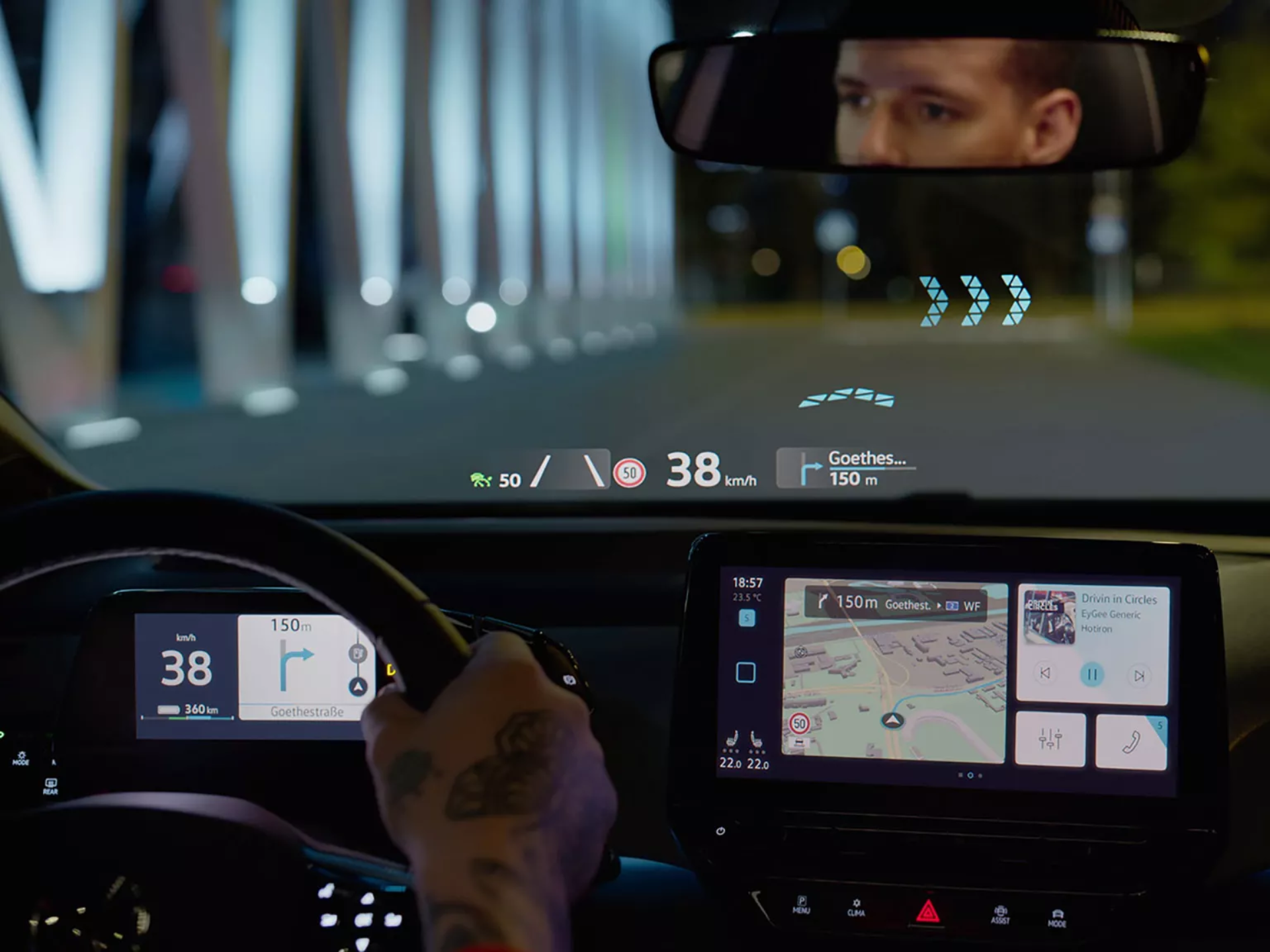 Volkswagen ID.3 AR heads up display, road in front of vehicle and infotainment system. Telling driver to turn right