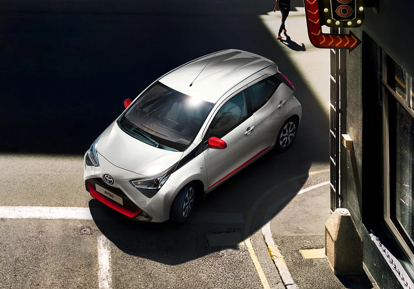 Toyota silver and red.