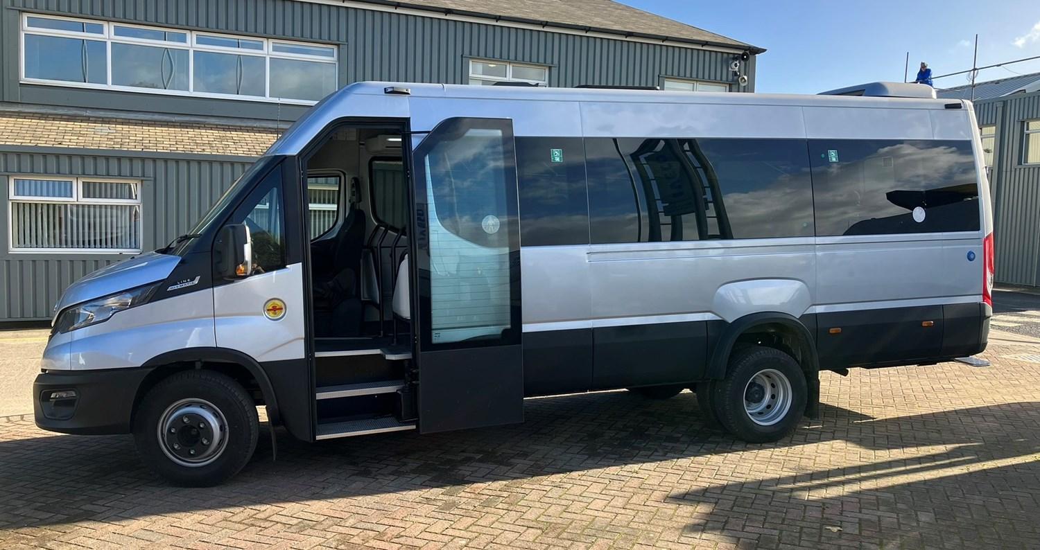 IVECO Daily Minibus front side view in silver with door open