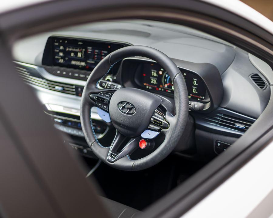 Hyundai i20n interior, steering wheel, infotainment system and speedometer