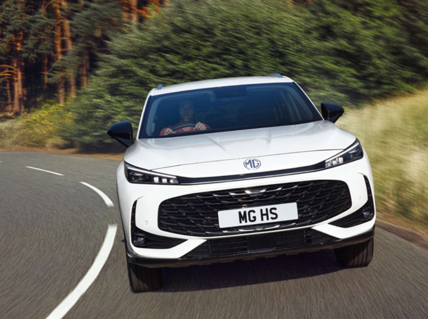 MG HS Plug-in Hybrid white driving shot