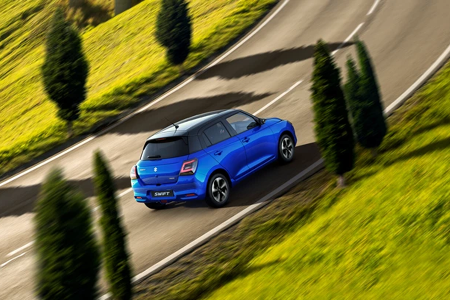 Blue Suzuki Swift Rear Side View