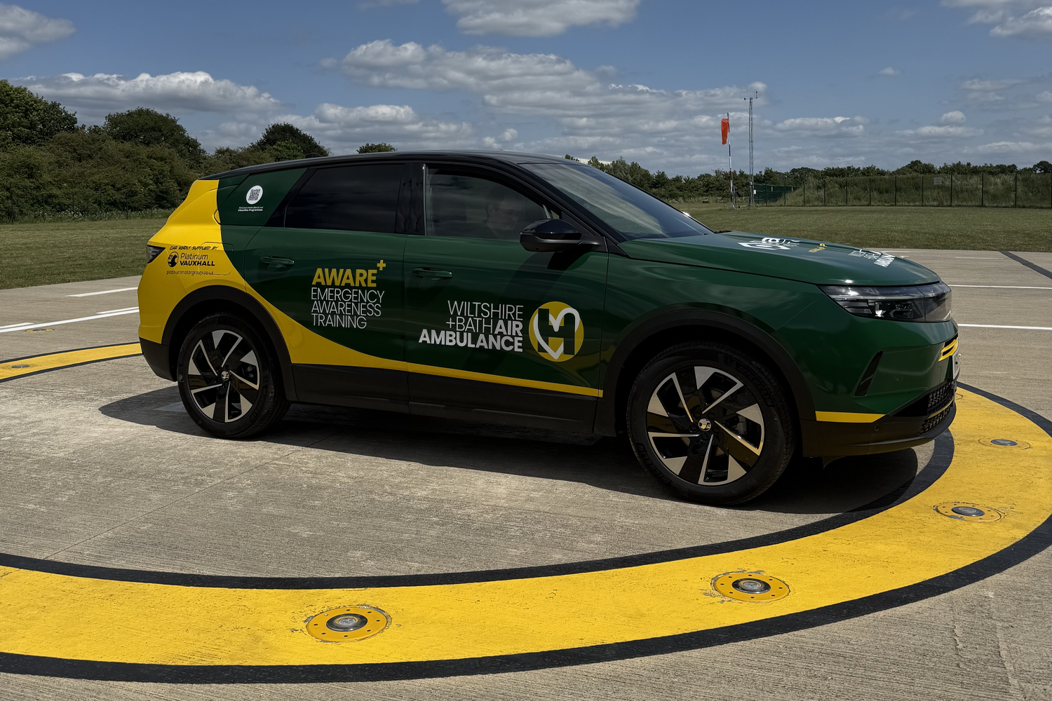 Vauxhall Grandland Hybrid wrapped in Wiltshire and Bath Air Ambulance Signage