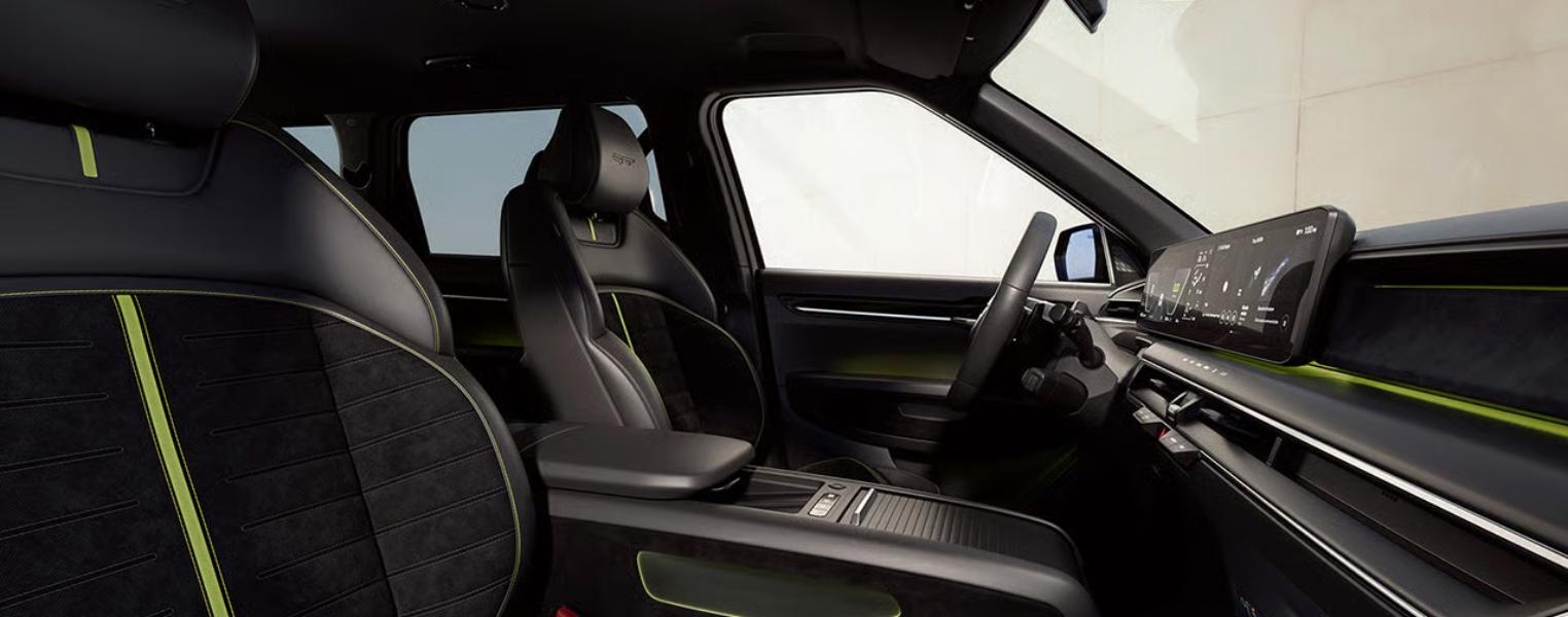 Kia EV9 GT Interior featuring the front seats, dashboard, centre console, steering wheel and windows.