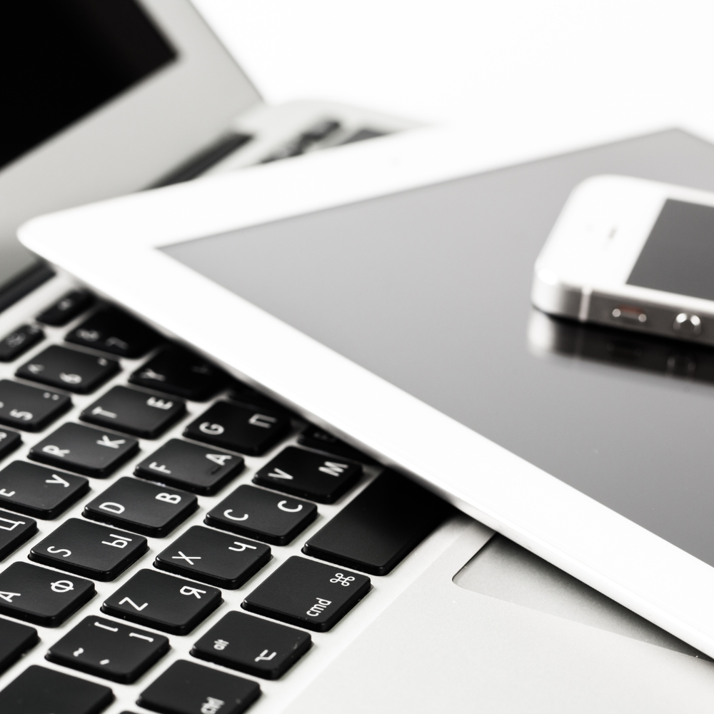 Laptop Keyboard, iPad, and iPhone