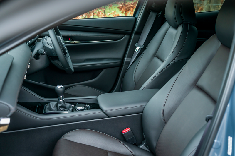 The interior view of the Mazda3 hatchback from the passenger side.