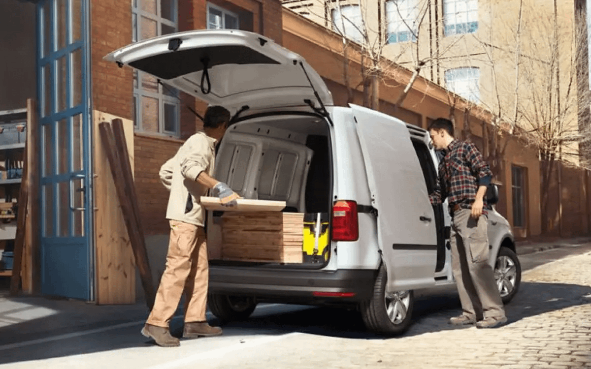 People loading Volkswagen Van