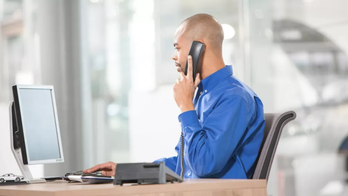 Volkswagen Employee on phone