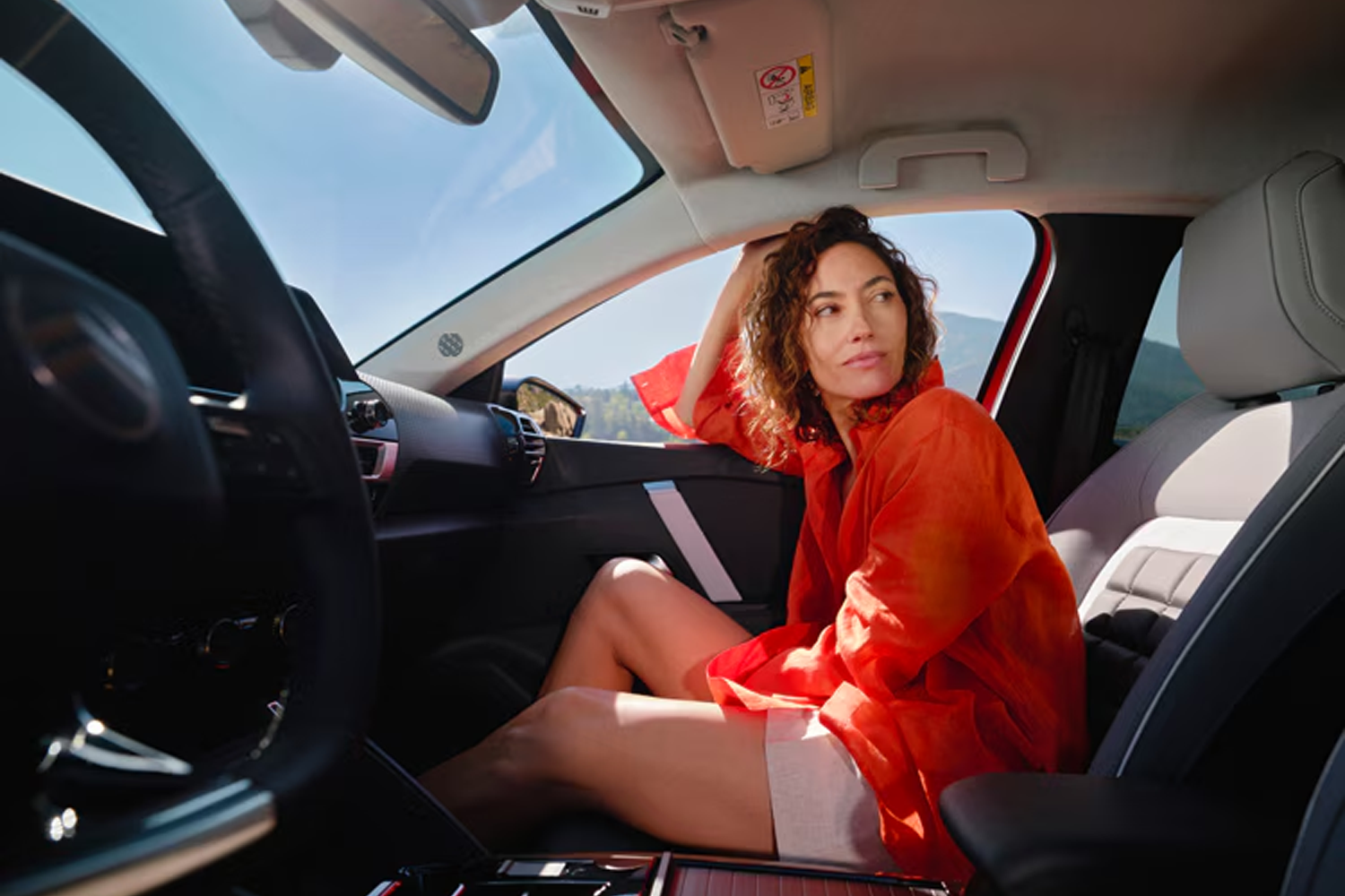 lady sat in front passenger seat of New C4