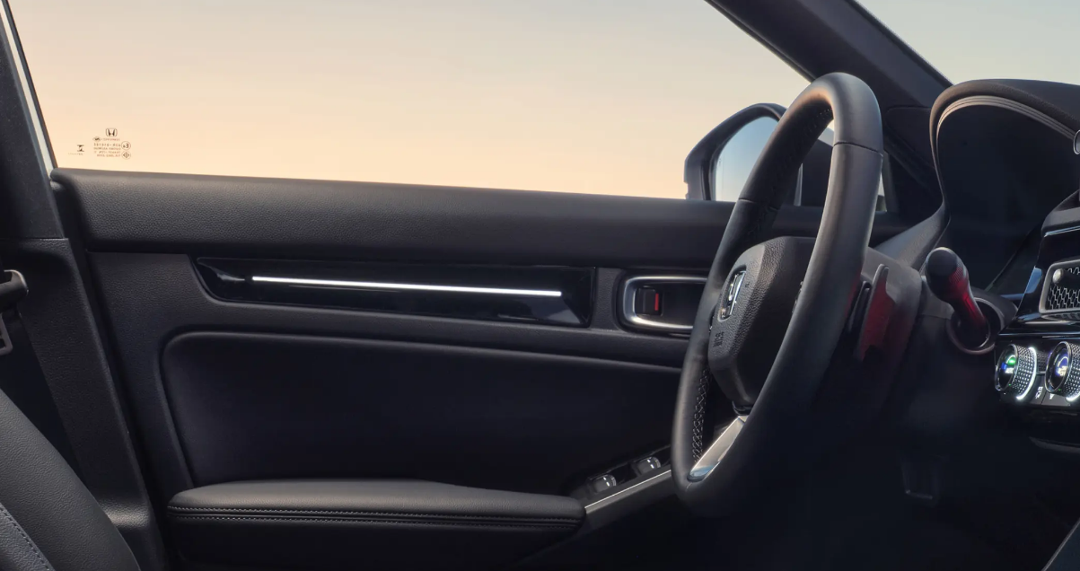 The internal driver door within the Honda Civic
