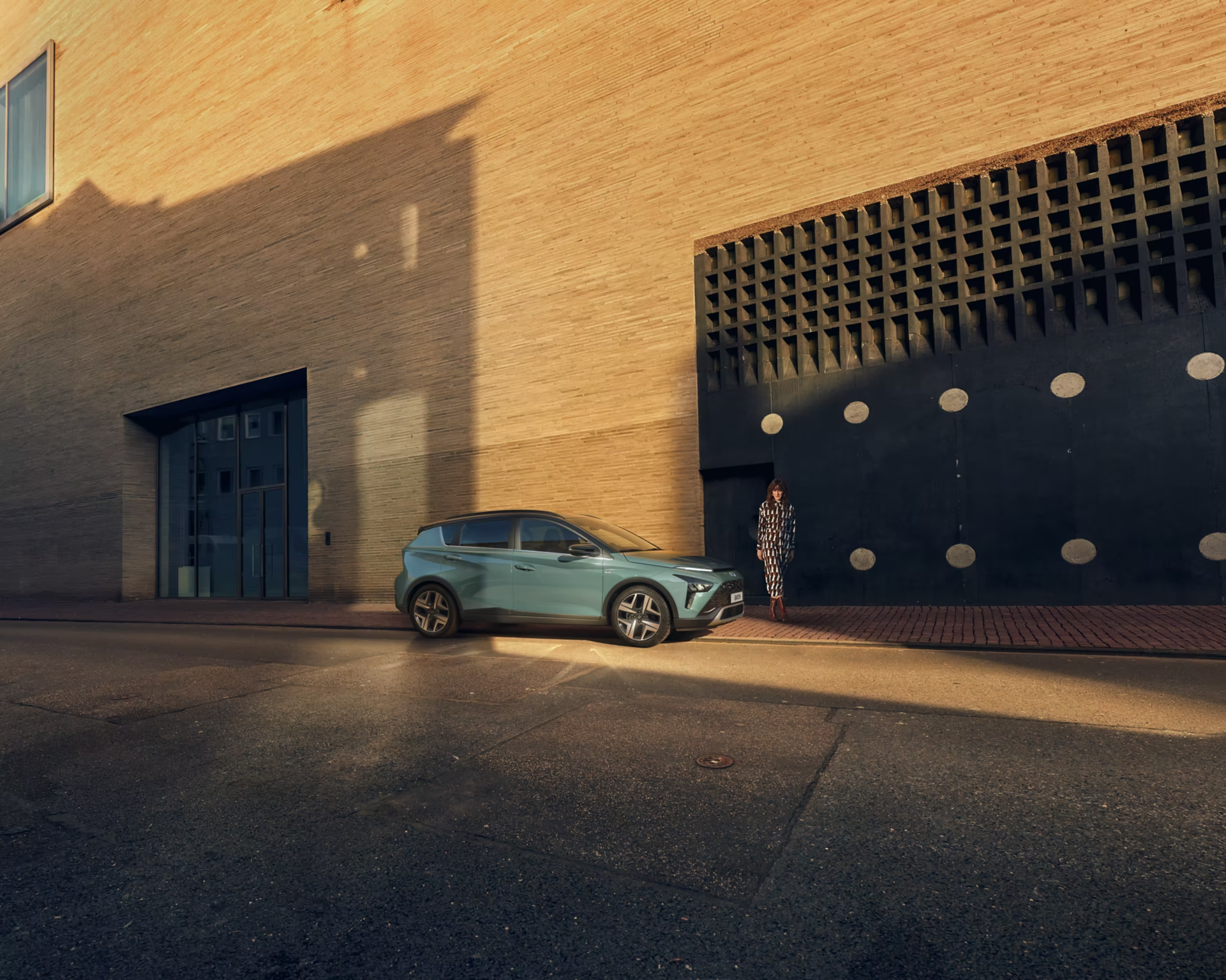 Woman walking in front of a car