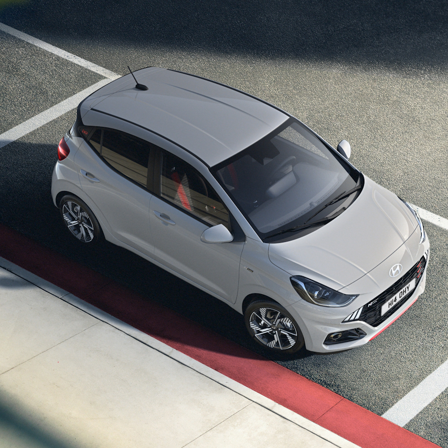white i 10 parked