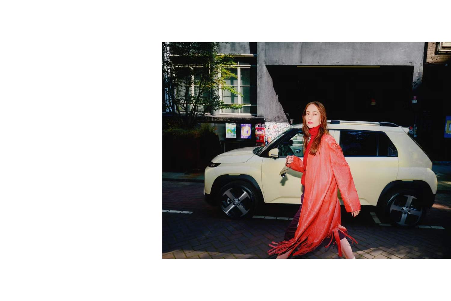 woman walking infront of hyundai INSTER