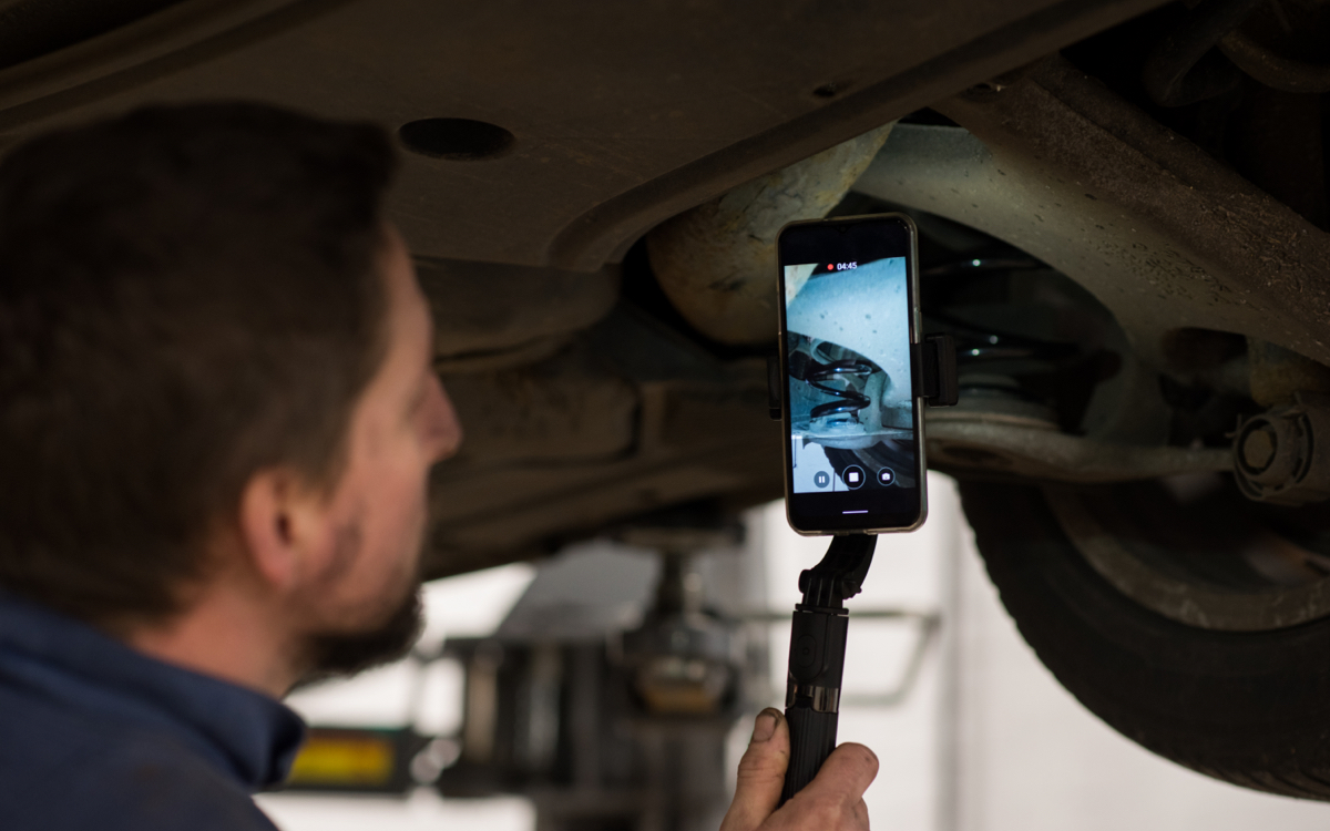car suspension being checked
