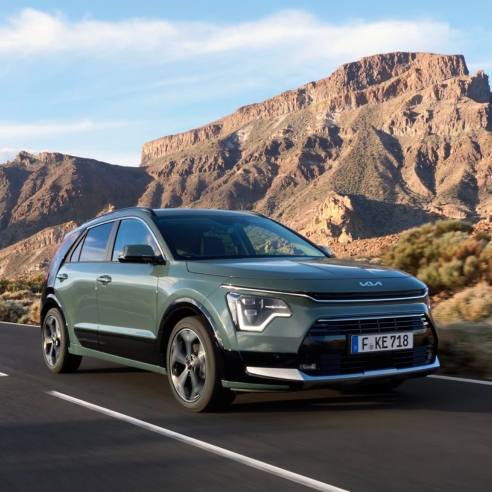 Kia Niro Hybrid Driving Mountain Side