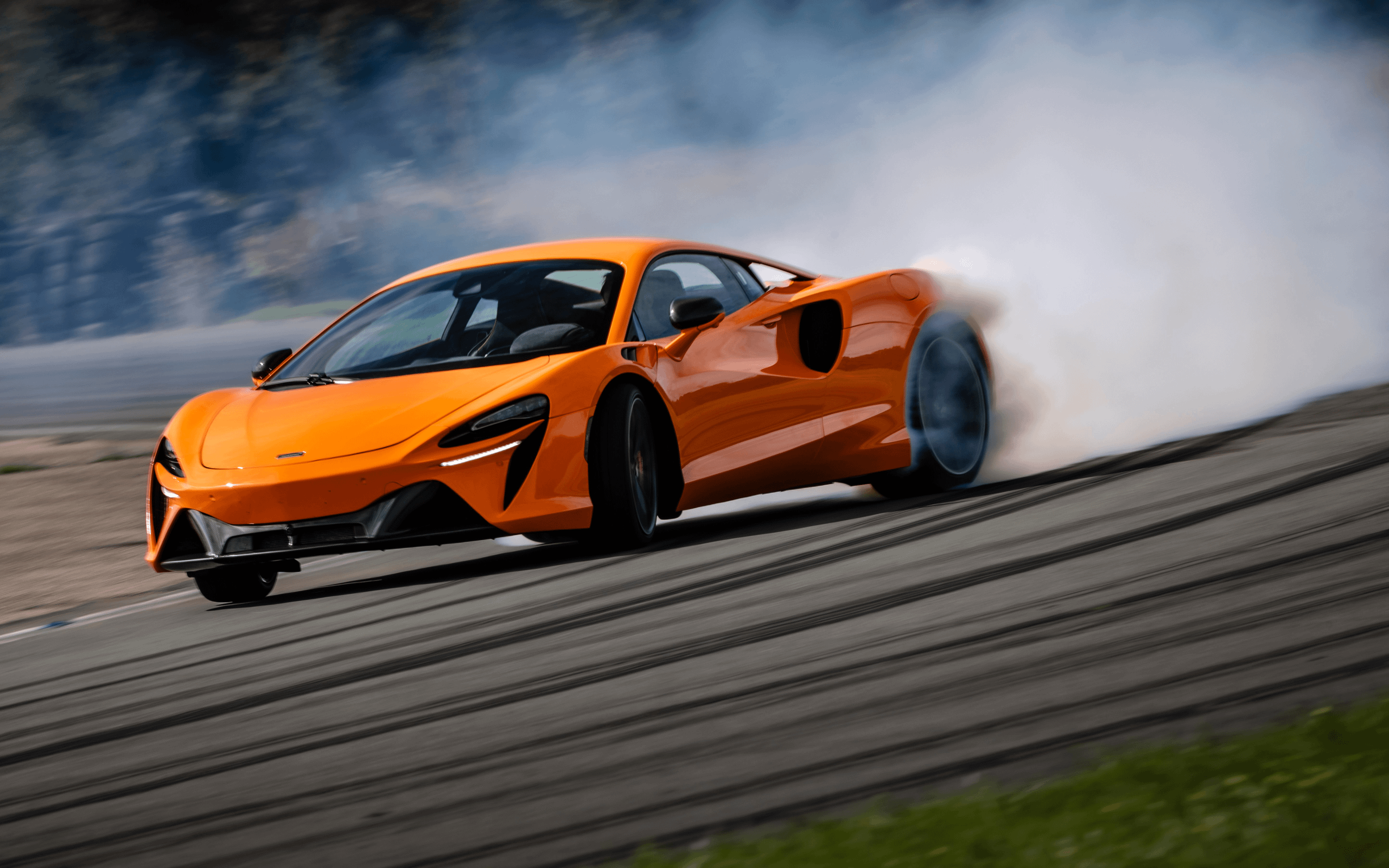 Orange McLaren Artura Drifting