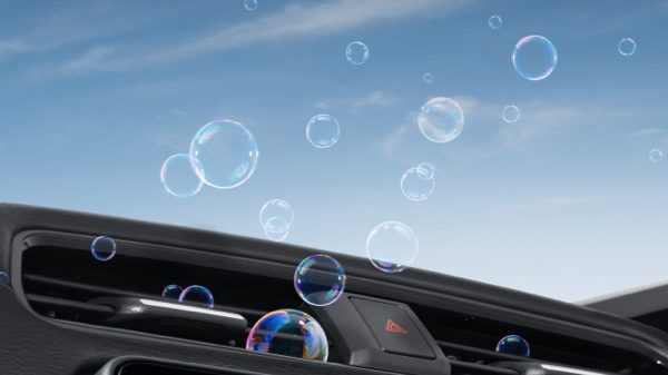 Nissan air vents with bubbles coming out to represent Nissan air con check and cleanse