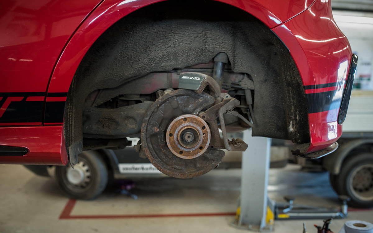 car with wheel removed
