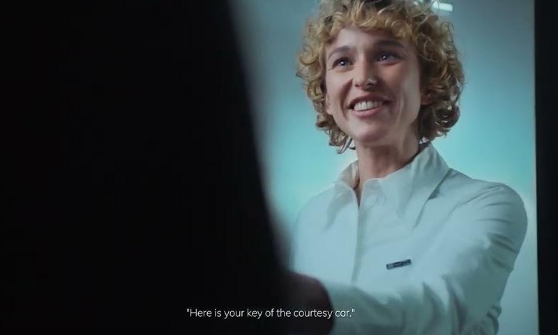 Person Smiling receiving keys