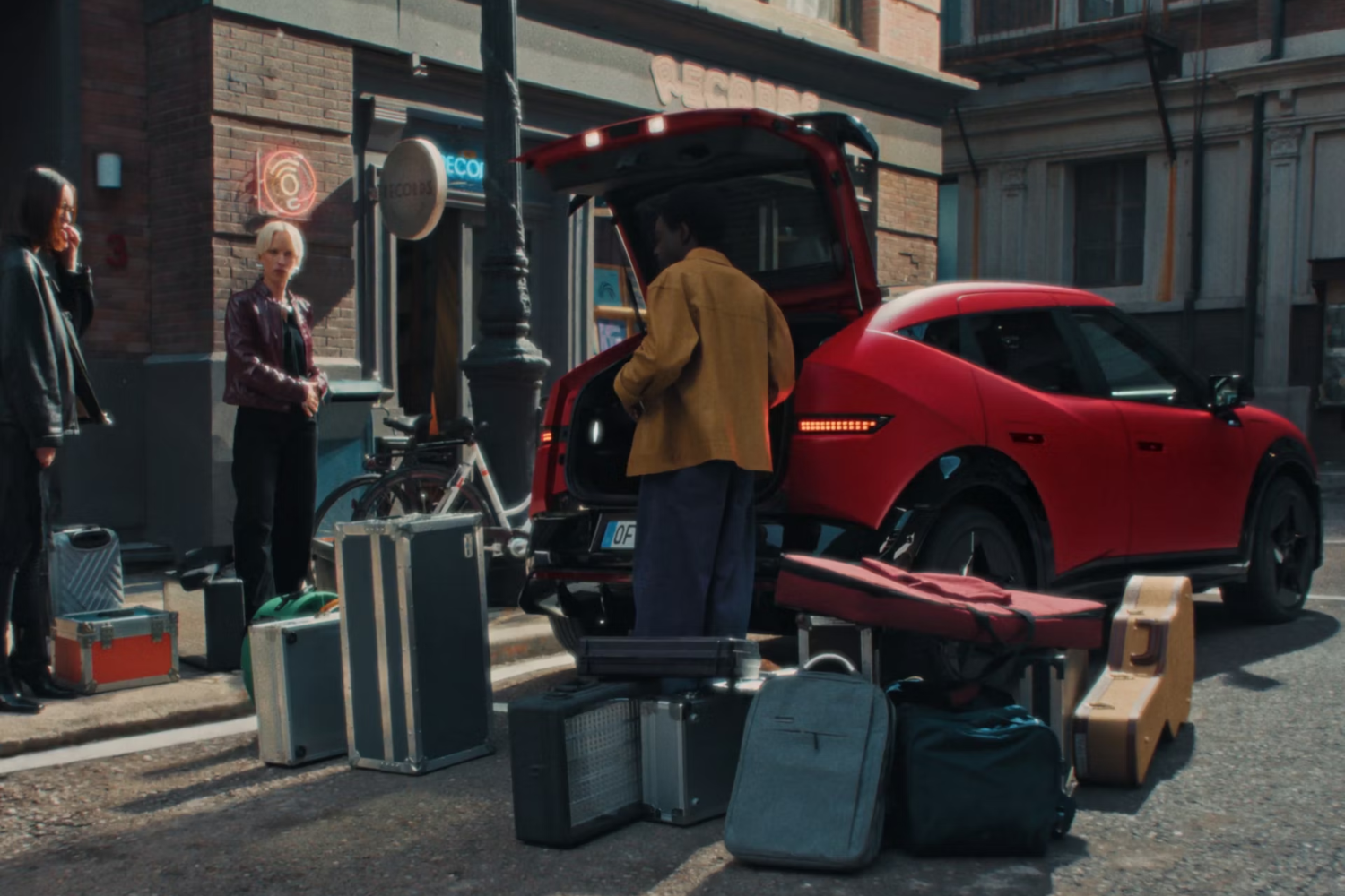 person with a load of luggage looking boot of new IONIQ 3