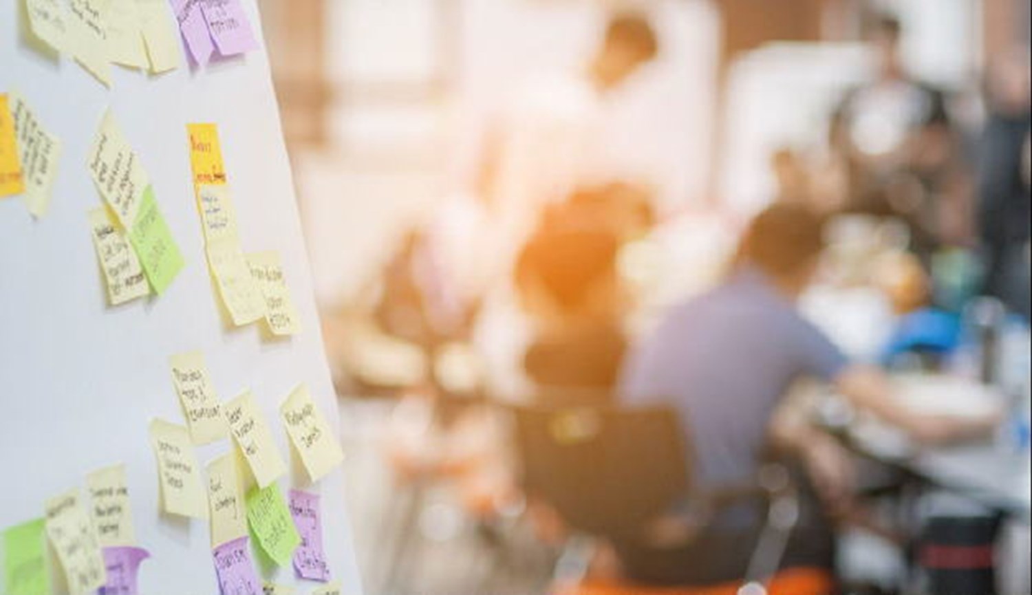 Board with Sticky Notes on it
