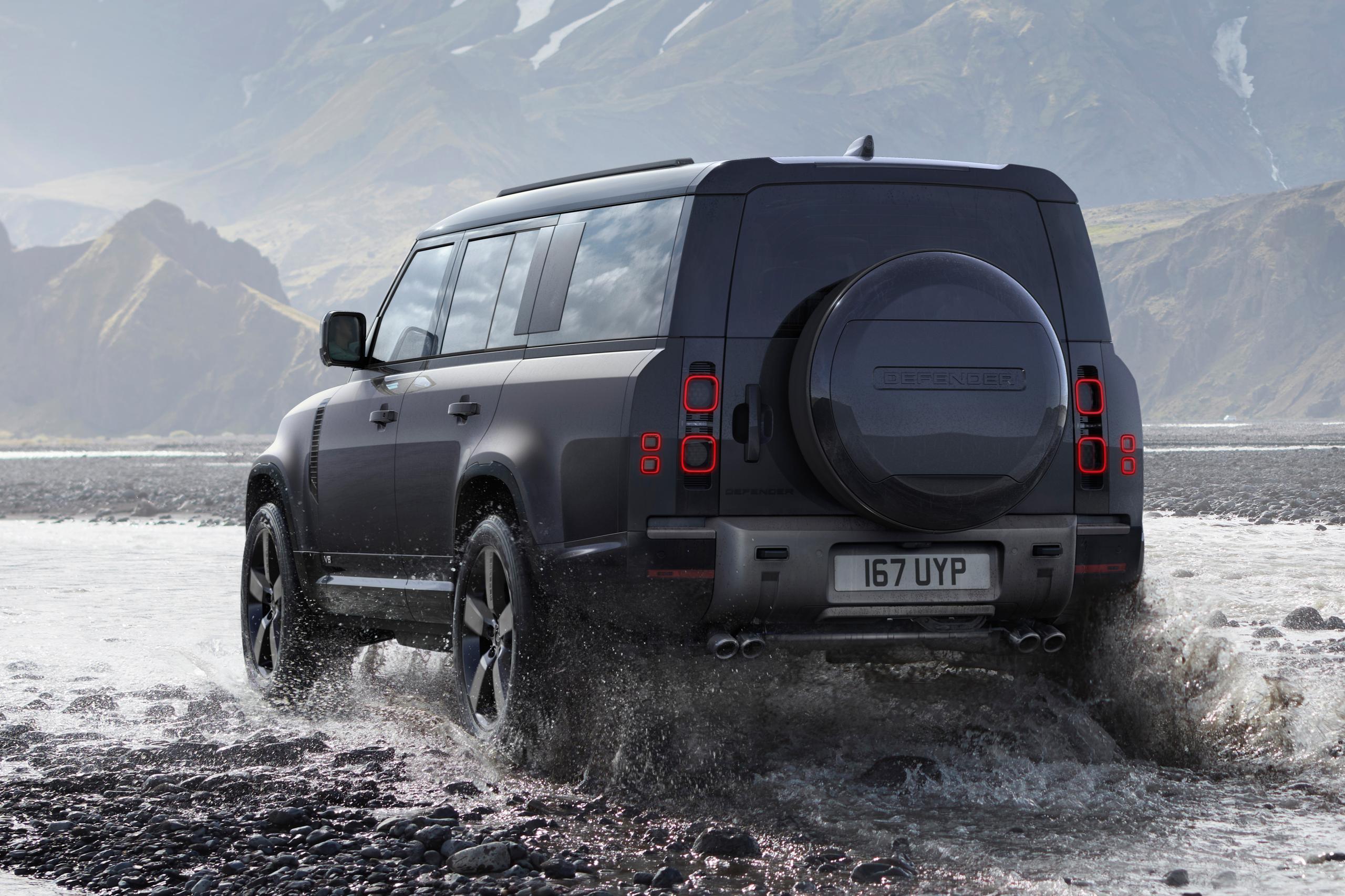 off-roading Defender 130 in water
