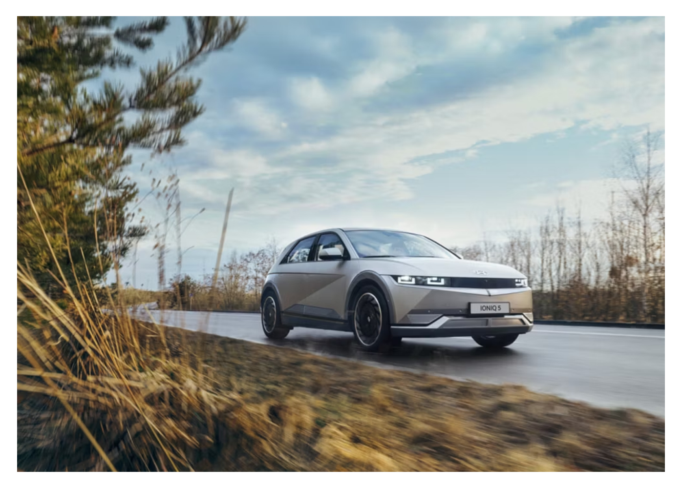 silver hyundai IONIQ 5 on the road