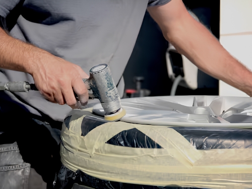 Professional preparation of an alloy wheel for refurbishment and repair.