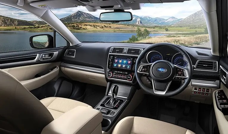 Subaru Outback Dashboard parked by lake