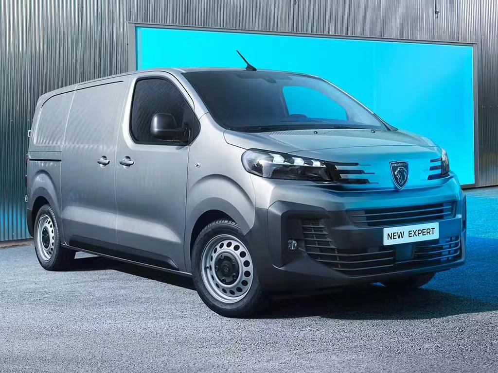 Peugeot Expert panel van presented in a clean industrial environment.