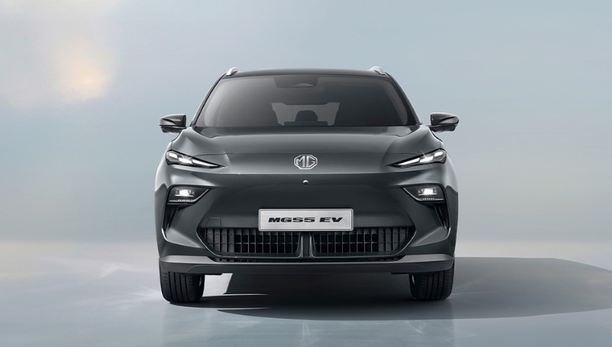 Black MG5 EV front exterior view in a white studio environment.