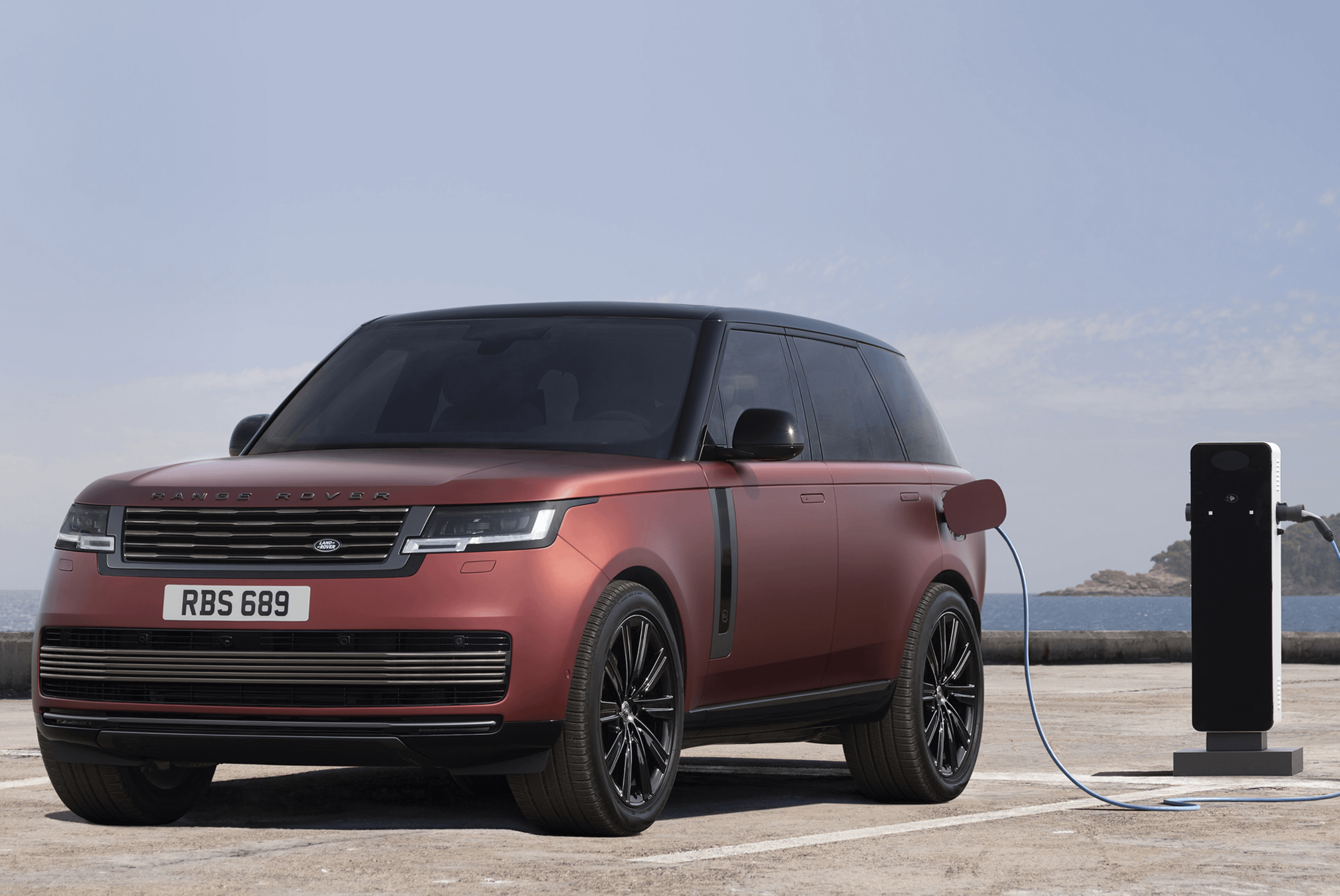 Red Range Rover Electric Hybrid On Charge