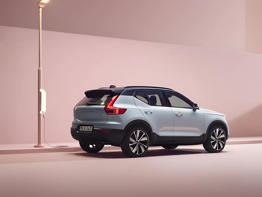 Volvo car charging in a studio background
