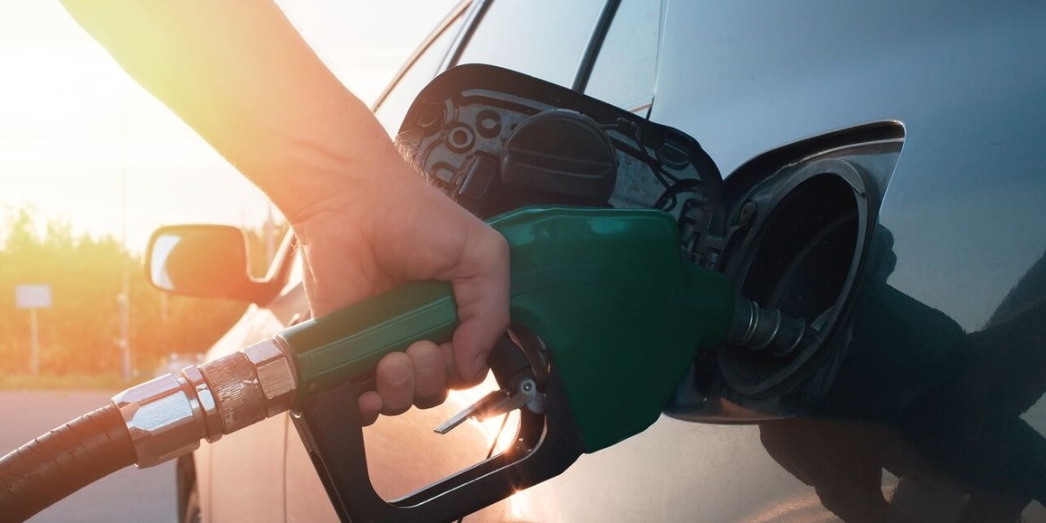 hand holding fuel pump