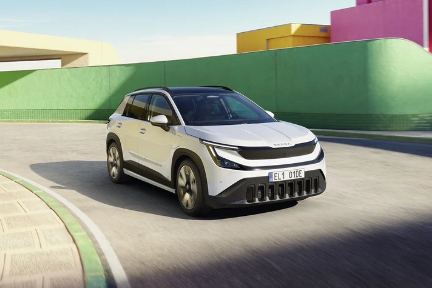 New, All-Electric Skoda Epiq driving on a road