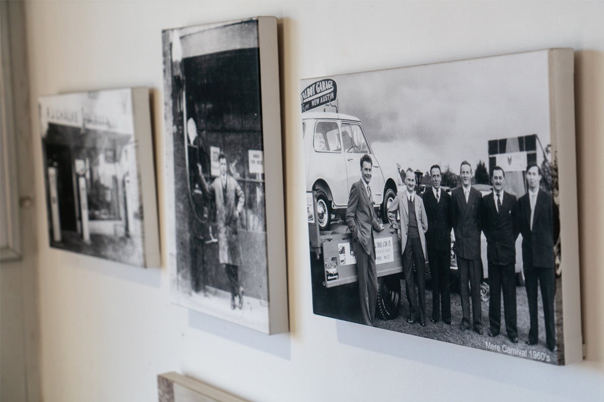 Close up of black and white photos on FJ Chalke wall