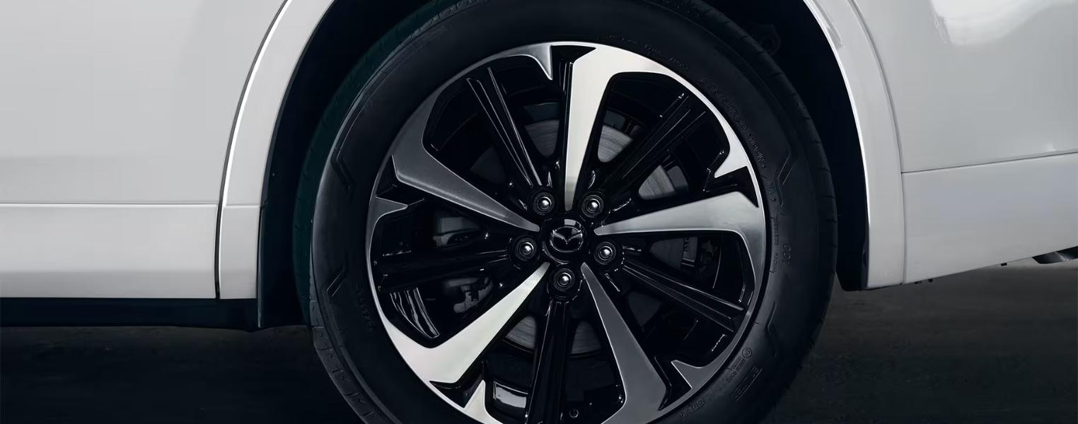 Close-up of Mazda CX-60 alloy wheel design.