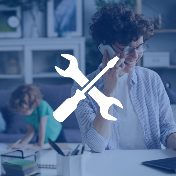 Spanner and wrench icon with people in the background.