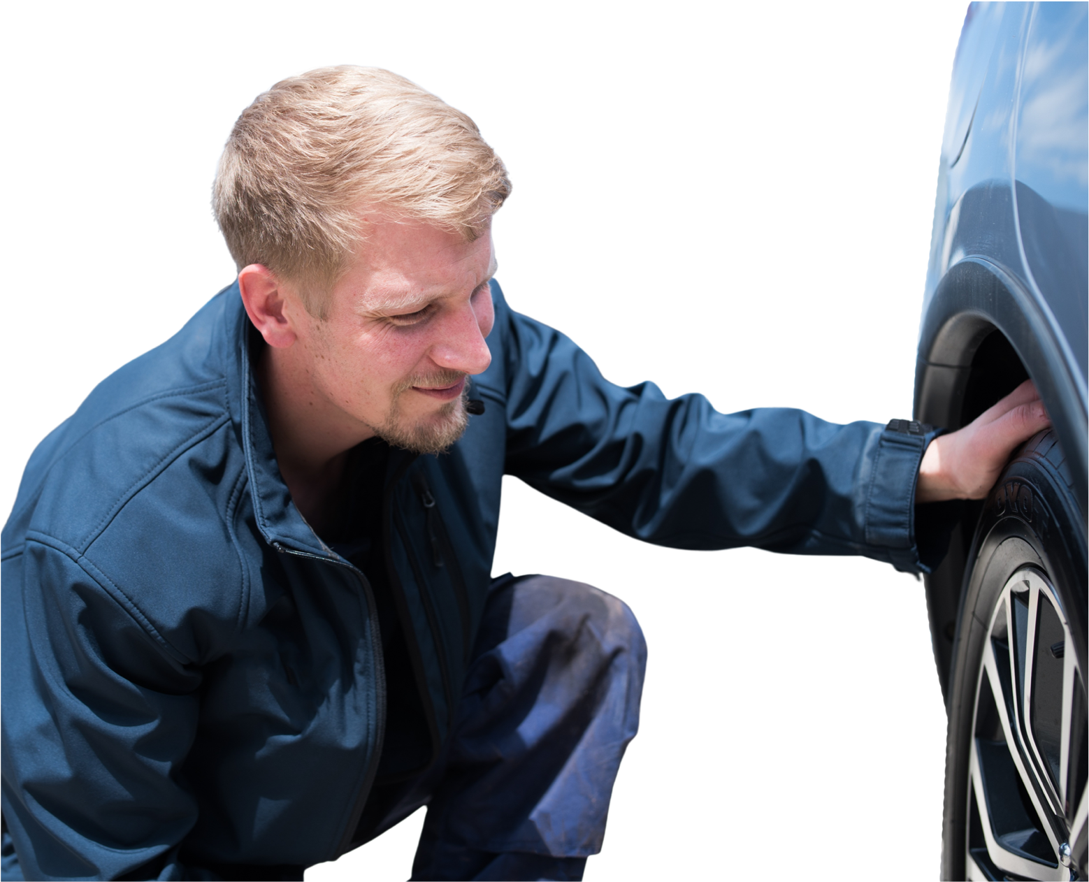 Man checking tyres